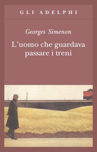 UOMO CHE GUARDAVA PASSARE I TRENI