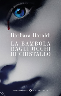 BAMBOLA DAGLI OCCHI DI CRISTALLO