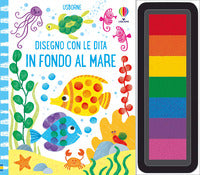 Disegno con le dita in fondo al mare 