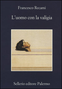 Uomo con la valigia 