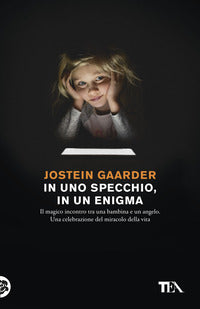 In uno specchio in un enigma 
